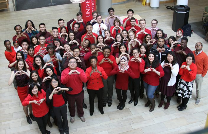 Faculty and Students Gather in the Ellen H. Yankellow Grand Atrium for the Annual "Wear Red Day" Photo