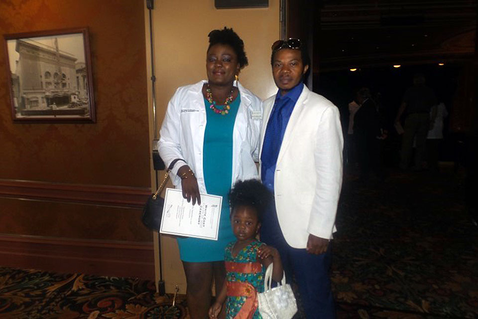 Second-Year Student Pharmacist Marie-Helene Meikengang Njomene Pictured with Her Family