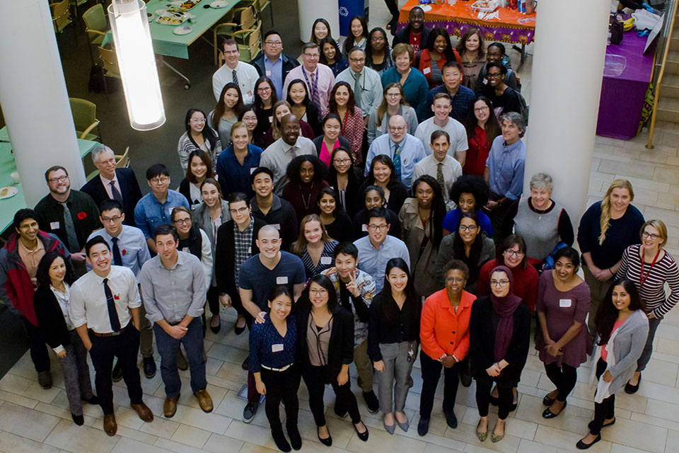 Students and faculty who attended the "Student FaculTEA Party" pose for photo in the Ellen H. Yankellow Grand Atrium.
