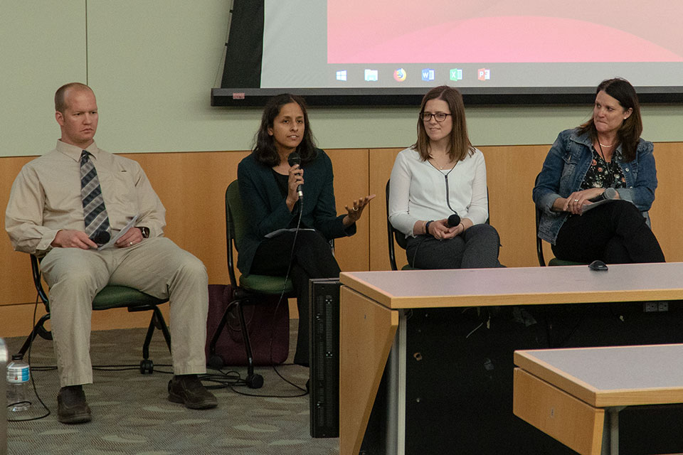 Panelists from Left to Right: Drs. David Harbourt, Rekha Rapaka, Ashley Martinelli, and J. Kristie Johnson