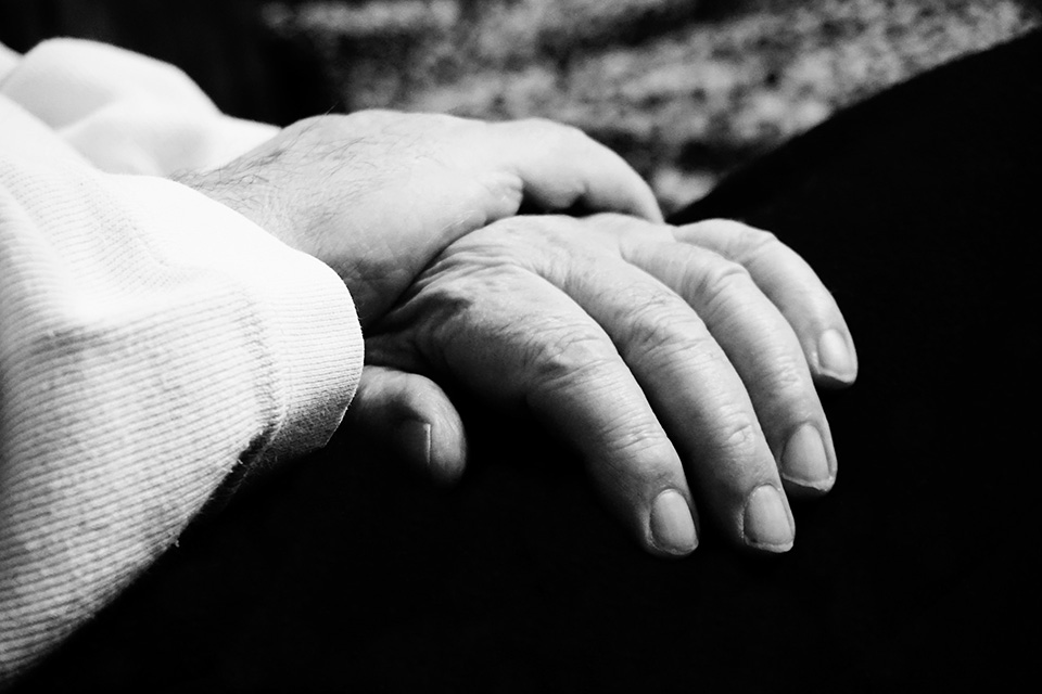 Hands holding each other